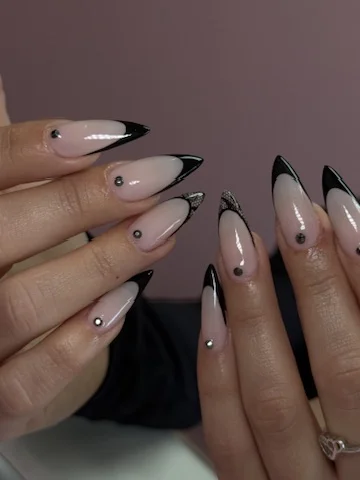 Black French tip nails with rhinestones - elegant nail art for The Woodlands clients