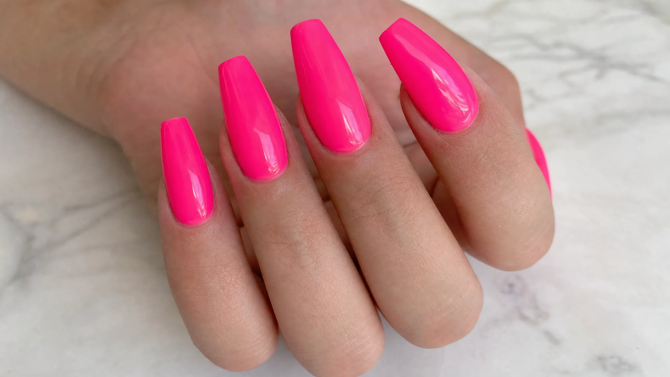 Neon bright nails — vibrant neon pink and orange for bold summer style